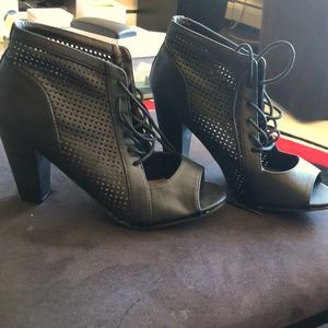Black healed open toe boots